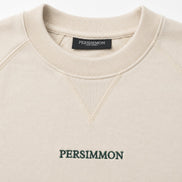 Cream sweatshirt with 'PERSIMMON' branding on a white background