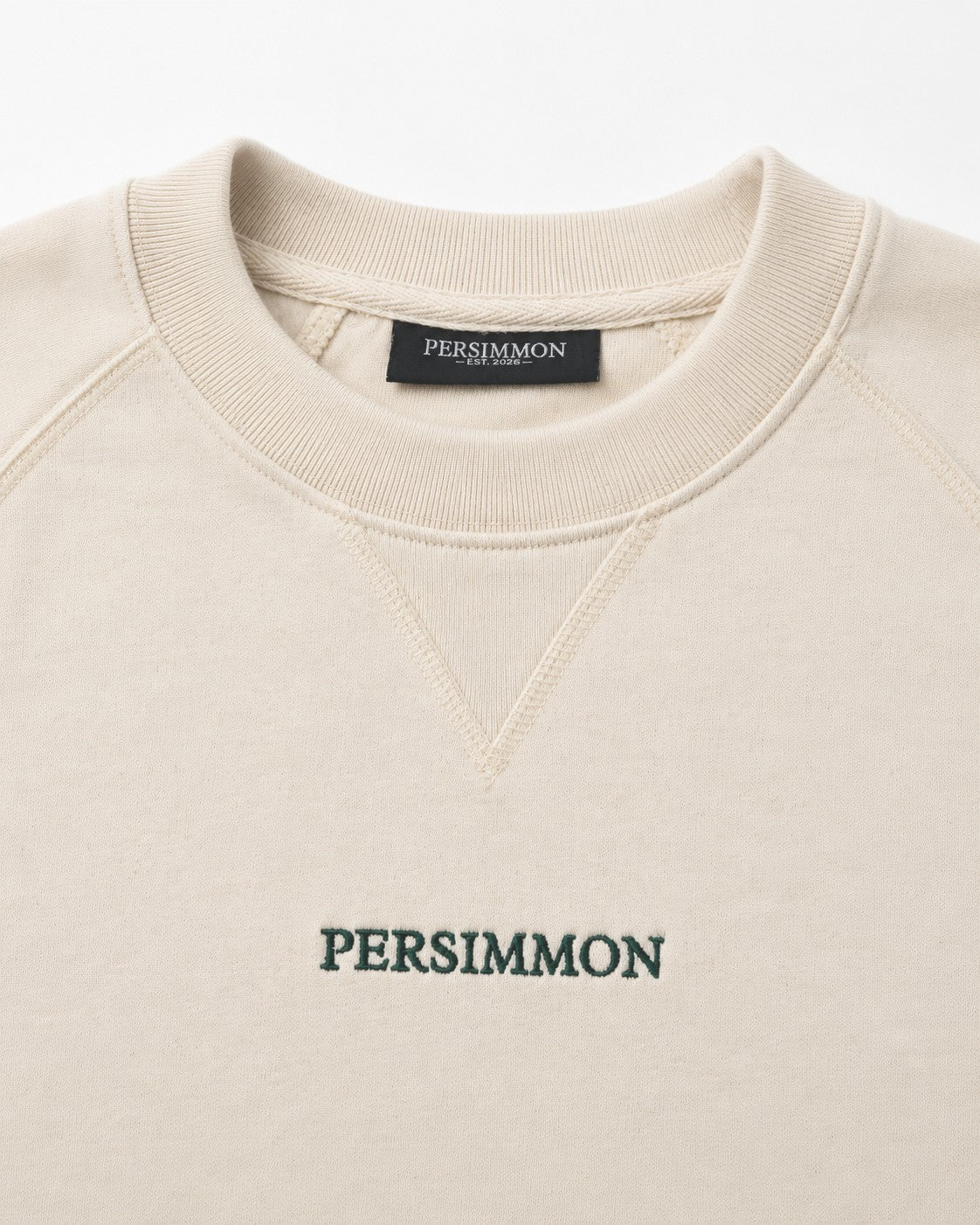 Cream sweatshirt with 'PERSIMMON' branding on a white background