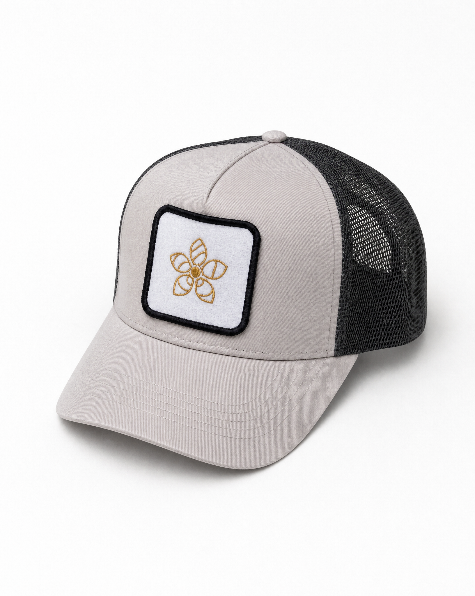 Trucker hat with a Persimmon logo patch on a white background