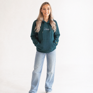 Female wearing a green hoodie with Persimmon logo on a white background